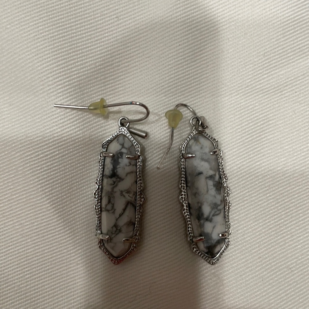 Kendra Scott earrings.